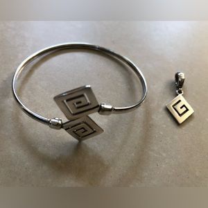 Two-Piece Sterling Silver Bracelet and Matching Pendant.